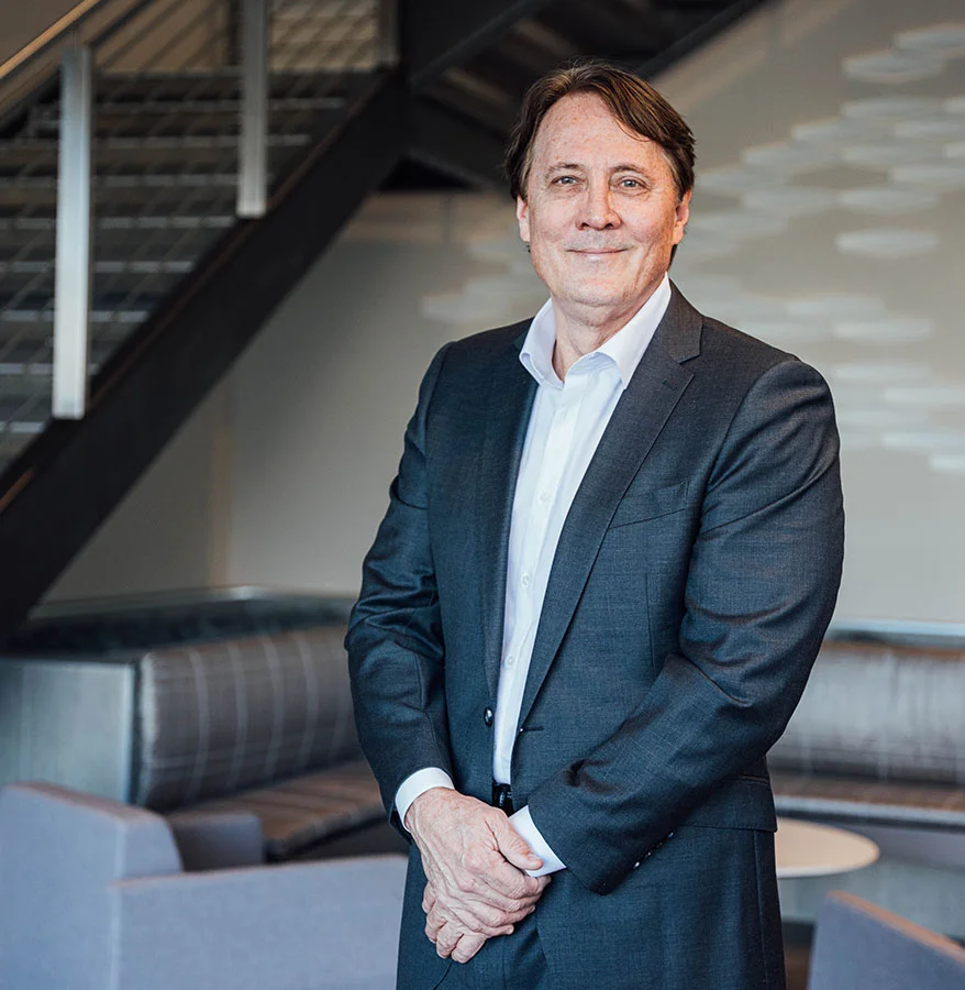 Portrait of Michael Sundine MD, FACS at his practice in Newport Beach